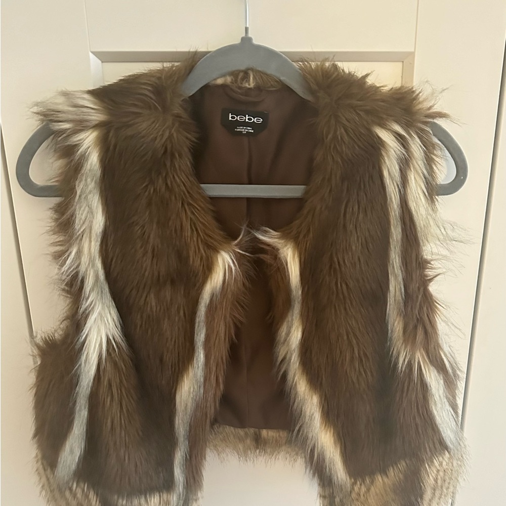 Super cute cared for faux fur vest